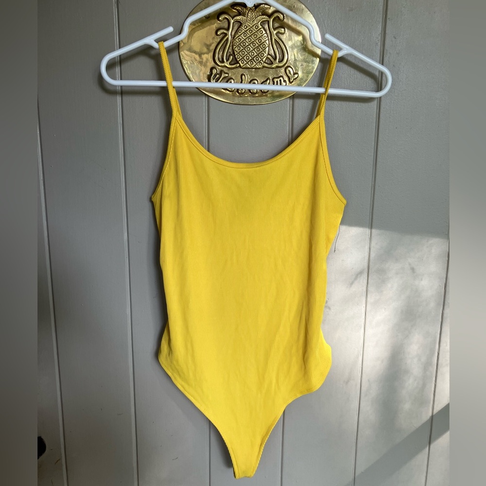 Yellow bodysuit